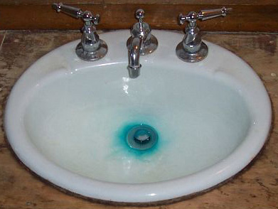 Blue green stains in sink